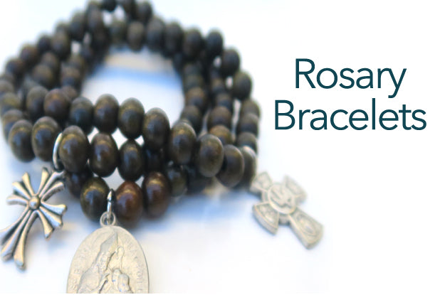 classic wood bead bracelets embellished with crosses and inspirational charms